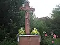 Barockes Sandsteinkreuz vor der Kirche