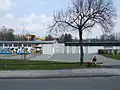 Betriebseingang mit Rutsche und Sprungturm