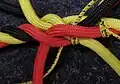 und unter das rote Kardeel.