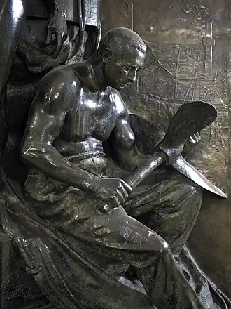 Detail der Skulptur: Werftarbeiter