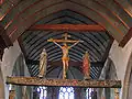 Triumphbalken in der Kirche von Lampaul-Guimiliau
