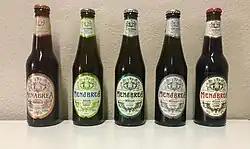 Vier 33-cl-Bierflaschen der 150-Jahr-Jubiläumsreihe von Menabrea