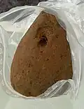 Pyramidenförmiges Webgewicht in Verpackung