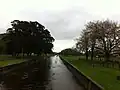 Der Liesbeek River in Rosebank mit Blick nach Mowbray zur Durban Road