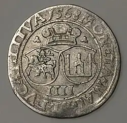 Eine litauische Münze von 1568 des Großherzogs Sigismund II. Augustus mit Vytis (Waykimas) und den Säulen von Gediminas