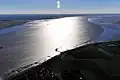 Rechts Neuenfelder Sand, links Mündung der Oste in die Elbe