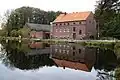 Die Buschmühle mit Weiher am Mühlenbach