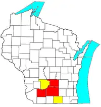 Die Metropolregion Madison (rot) mit Erweiterung zur Madison-Janesville-Beloit Combined Statistical Area (gelb)