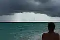 Dunkle Wolken kündigen Starkregen an, in der Regenzeit häufiges Phänomen