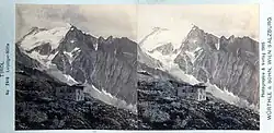 Stereoskopie des im Bau befindlichen Mandron Hauses, dahinter die Mandron Hütte. Im Hintergrund der Monte Gabbiolo (3458&nbsp;m) (1894)