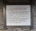 Tafel im Ein-/Ausgangstorbogen Südost mit Informationen zur Entstehung