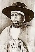 Menelik II.