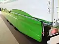 Moderner Tautliner mit Gummizug in Saumbögen
