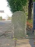 Ganzmeilenstein am Bahnhof Mügeln