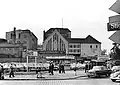 Der Blick fällt auf den Autohändler im Jahr 1962. Auf dem Areal steht derzeit der Glascontainer Nymphe.