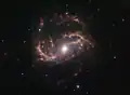 Infrarotaufnahme von NGC 1672, erstellt mithilfe des Spitzer-Weltraumteleskops