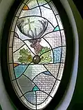 Hubertusfenster im Kirchenvorraum
