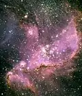 Aufnahme des Hubble-Weltraumteleskops, die angeregten Wasserstoff (rot wiedergegeben) aufzeigt, 2005