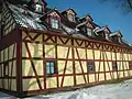 Egerländer Haus mit Fachwerk im Erdgeschoß in Nový Drahov