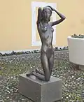 Onex, Genf. La Jeune Fille Agenouillée von Heinz Schwarz (1920–1994), Bildhauer, Maler
