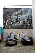 Erinnerungsstätte „Hexenwahn“ (Kunstwerk am linken Gebäude)