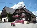 Halbbalkon unter dem Schopf (Steirerhof)