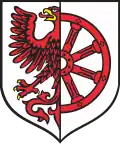 rechts ein halber Adler, links ein aus dem Spalt wachsendes Rad (Cedynia&nbsp;PL)