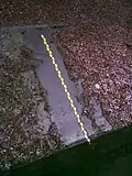 Geneigte Pegellatte an der Isar in München