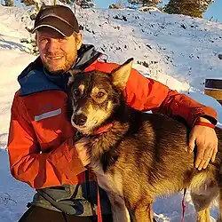 Man with a husky