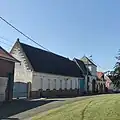 Haus mit Fischgrätengiebel