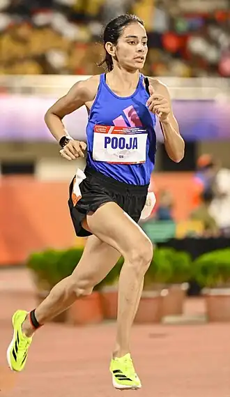 Pooja Chaudhary im Jahr 2025