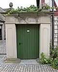 Portal aus Gnodstädter Sandstein mit Sturz aus 1820