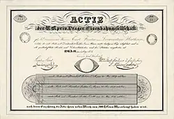 Gründeraktie der Prager Eisenbahngesellschaft über 500 Gulden, ausgestellt am 1. Mai 1828 in Prag auf den Fürsten Carl von Loewenstein-Wertheim, im Original unterschrieben u.&nbsp;a. von dem jüdischen Bankier Leopold von Lämel, Großfinanzier des österreichischen Staates. Als technischer Berater dieser Prag-Pilsener-Eisenbahn fungierte der Astronom, Physiker und Pionier des Eisenbahnbaus Franz Josef von Gerstner.