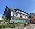 Rüggeberger Lädchen mit Milchkannen-Rampe