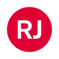 Rundes Liniensignet mit den weißen Großbuchstaben RJ in rot gefülltem Kreis vor neutralem Hintergrund