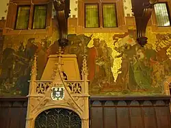 Rathaus St. Johann, Gemälde im Rathausfestsaal: Der heilige Arnulf von Metz weiht die erste Kapelle von St. Johann Graf Johann I. von Saarbrücken übergibt den Freiheitsbrief von 1322