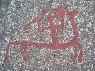 Reiter mit Speer in der linken und Schild, Paletta, Spaten bzw. Standarte in der rechten Hand