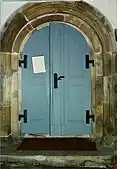 Romanisches Portal aus Grillenburger Sandstein in der Eingangshalle