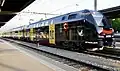 SCB-Werbezug der BLS im Bahnhof Thun[50]