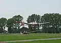 Abflug des SF25C Motorseglers D-KNIV der LSG Paderborn auf der Piste 06, im Hintergrund eine LAK 17 der LSG
