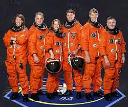 v. l. n. r. Sandra Magnus, David Wolf, Pamela Melroy, Jeffrey Ashby, Piers Sellers, Fjodor Jurtschichin