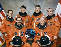 v. l. n. r. Daniel Bursch, Curtis Brown, Mario Runco, Marc Garneau, John Casper, Andrew Thomas