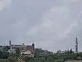 Der Campanile von San Mamiliano in Valli, links der Dom von Siena, rechts der Turm Torre del Mangia am Piazza del Campo