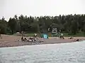 Badestrand Schladitzer Bucht mit Turm der Wasserwacht