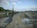 Erdarbeiten westlich der alten Schleuse, links das westliche Sparbecken, das im neuen unteren Vorhafen aufgeht, Mai&nbsp;2008