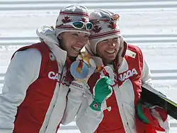 Beckie Scott und Sara Renner bei der Siegerehrung in Turin 2006