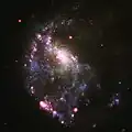… mit Überlagerung der Röntgenstrahlung (rot), aufgenommen durch das Chandra-Weltraumteleskop
