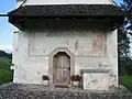 Klebdach an der Westseite der Kirche St. Dionys (SG)