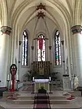 Blick zur Apsis mit Nothelferaltar