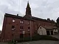 Kirche mit Pfarrhaus